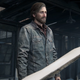 Ellie and David are seen standing at a dilapidated wooden balcony with snow sitting on the wreckage.